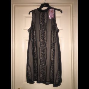 Swing dress with a lace overlay
